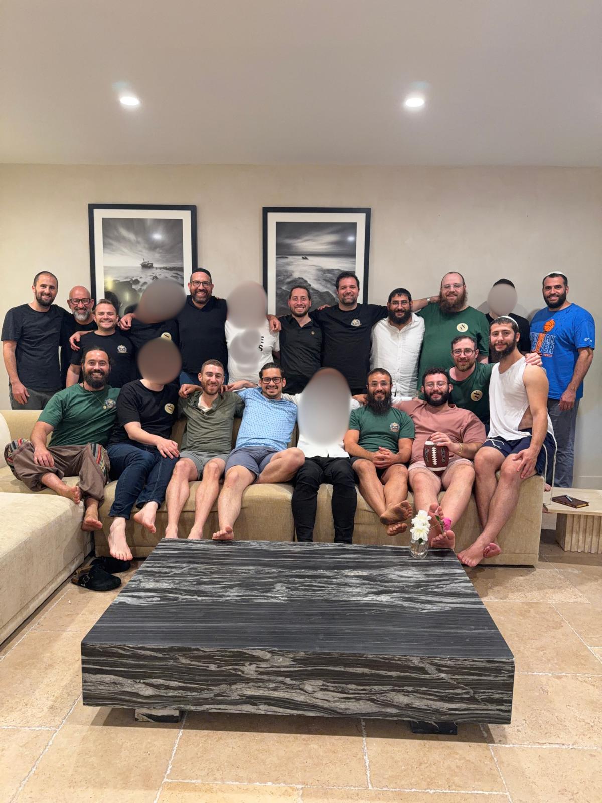 Ahdama group gathered together indoors