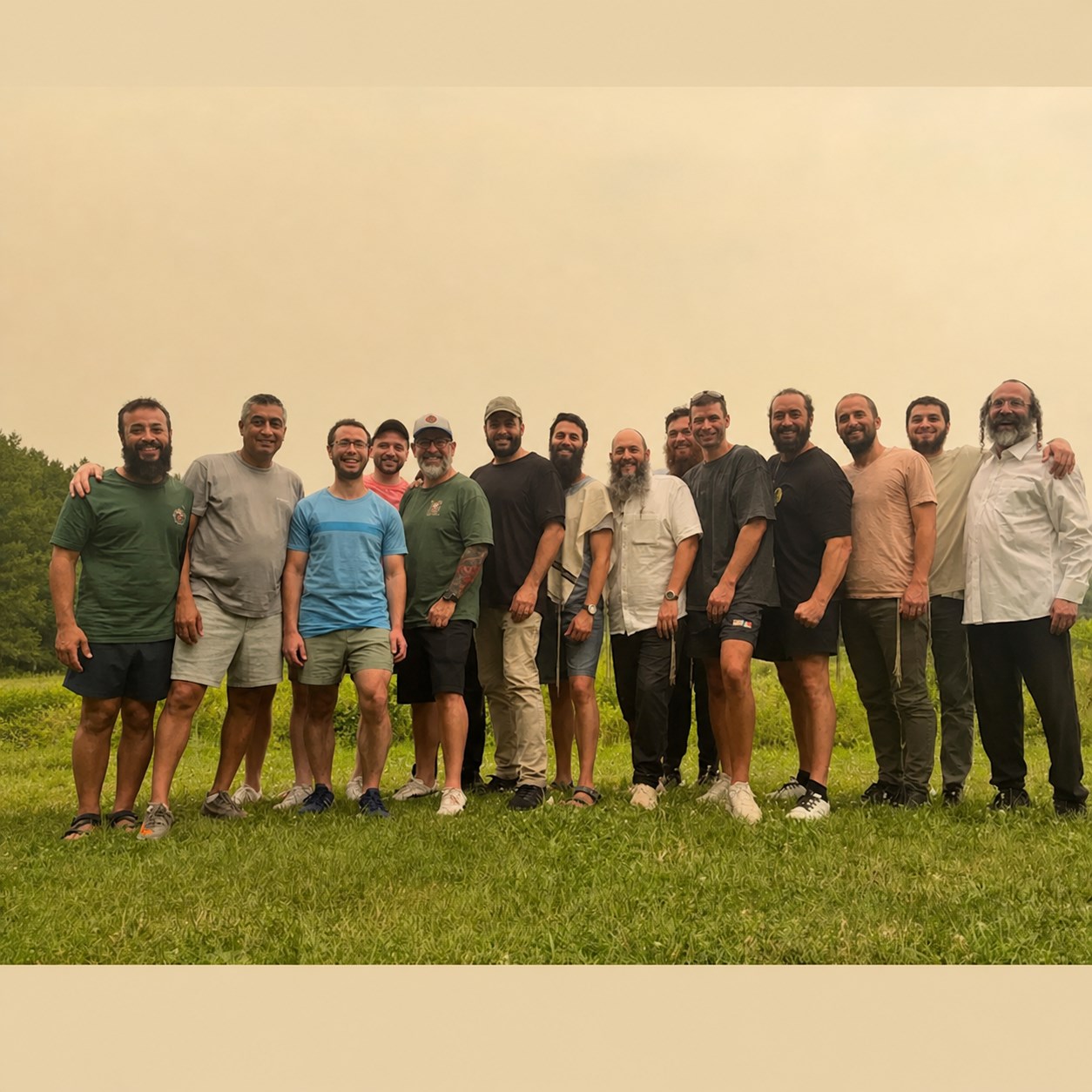 Ahdama group standing together in a field